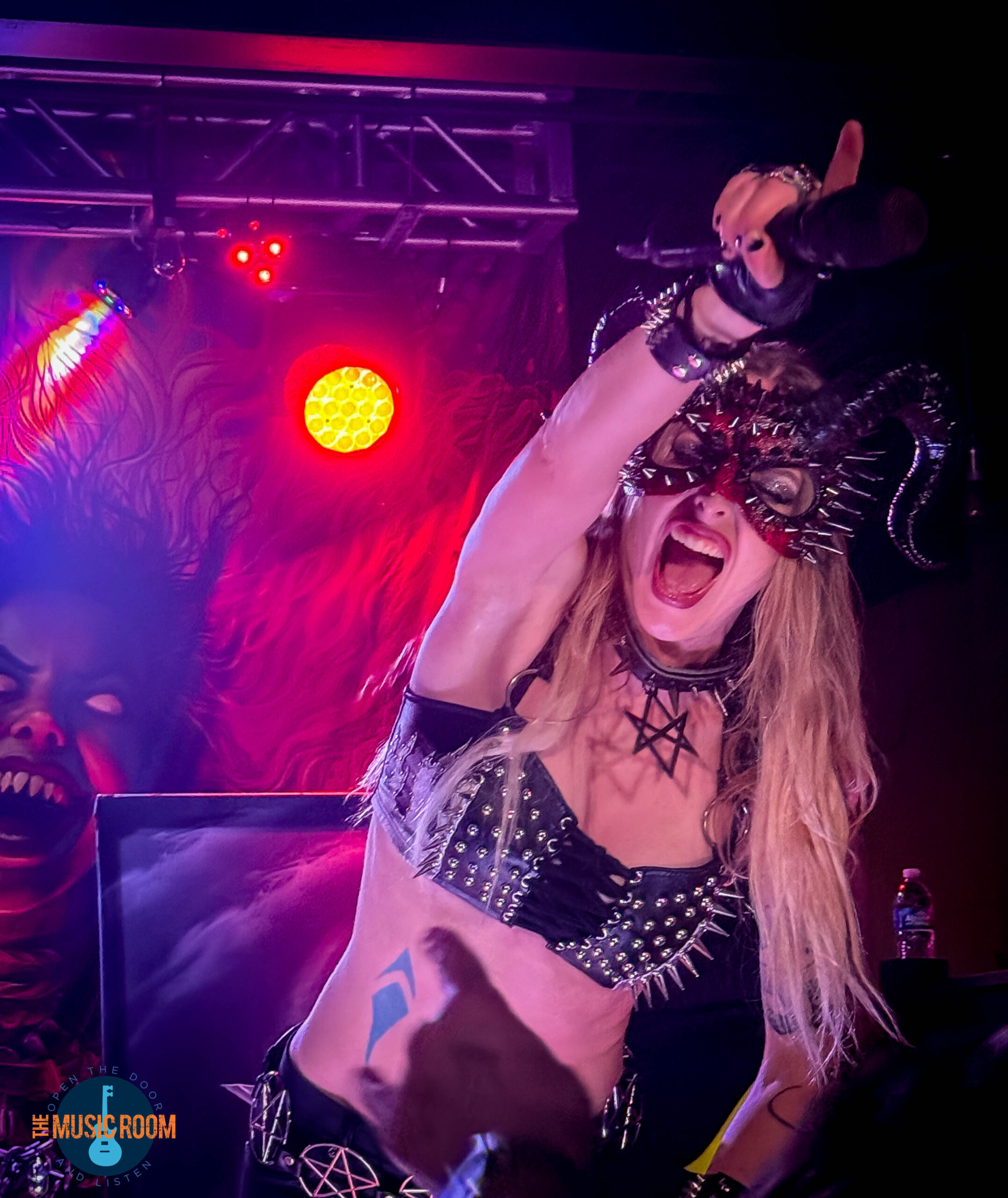 Laura Guldemond of Brining Witches wearing a mask in Newport, KY 